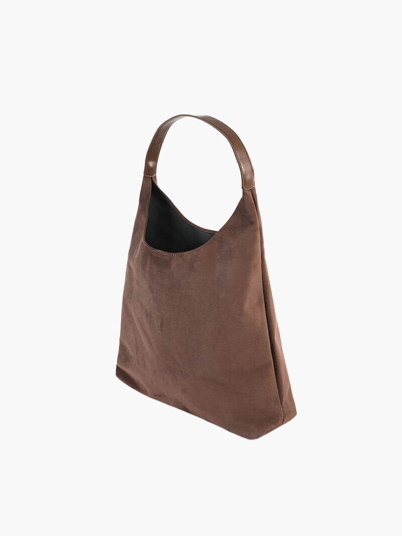 Handtasche in Wildlederoptik