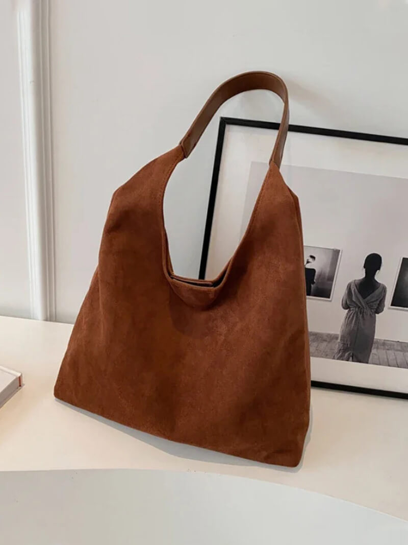 Handtasche in Wildlederoptik